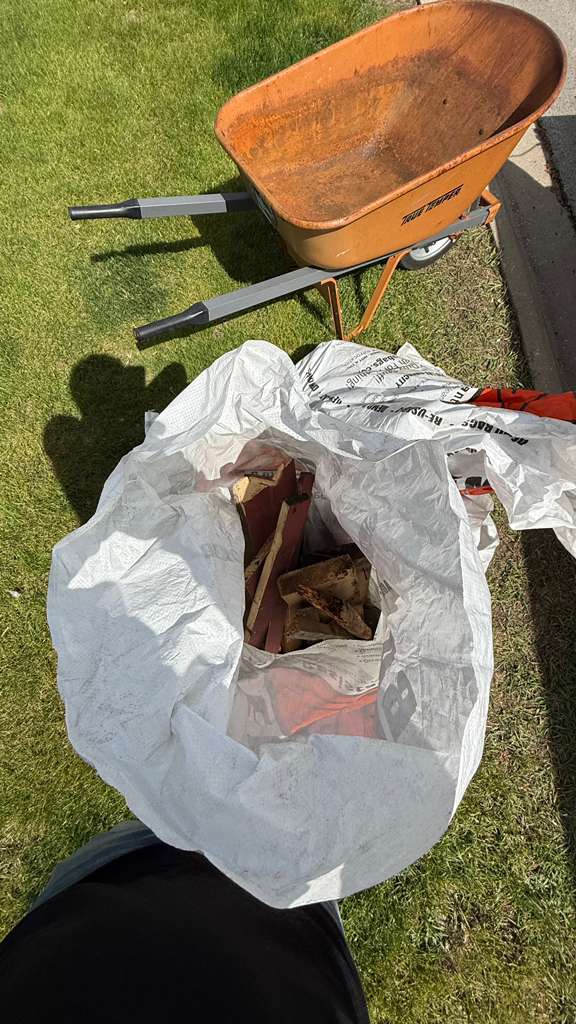 Filled demo bag with broken patio wood Schaumburg